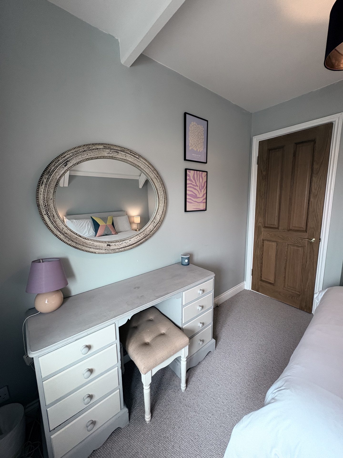 Bedroom corner with dressing table and mirror